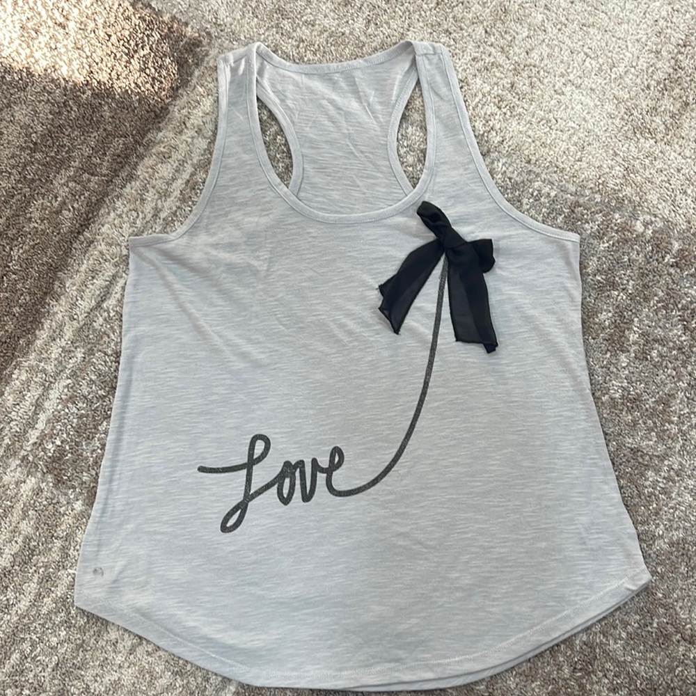 Grey tank top with black fabric bow